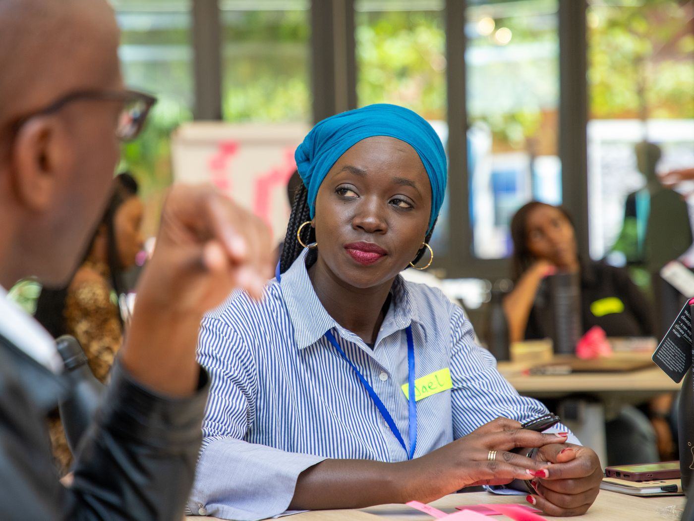 A member speaks during a roundtable working session